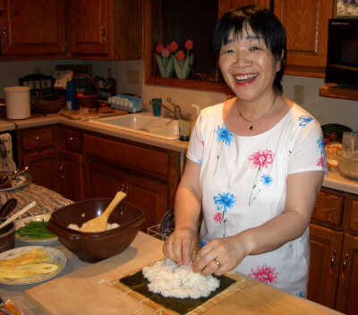 Keiko teaching us the art of sushi, Aug. 2005.