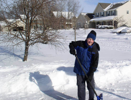 Mark shoveling snow on our driveway - always a great helper!