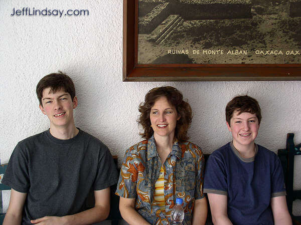 Waiting at a bus station in downtown Oaxaca, on our way to Monte Alban. March 2005.