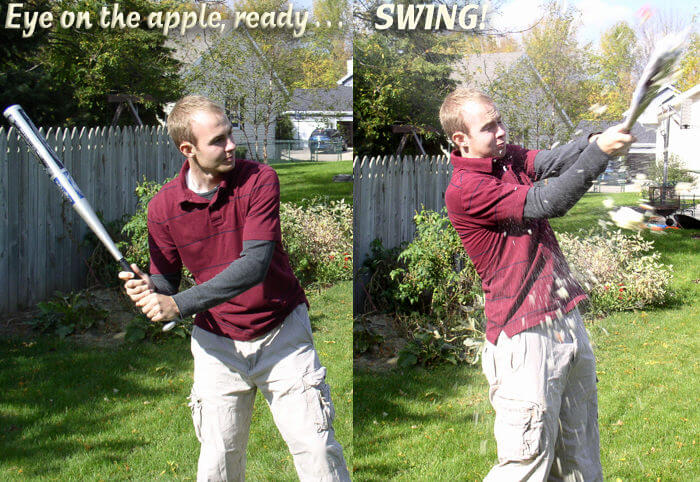 Daniel swings at some pitched apples from our tree, October 2007.