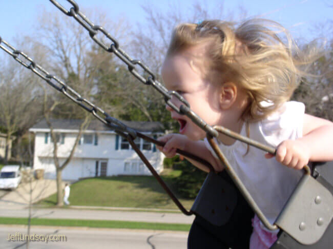 Anna loves to swing! Madison, April 2008.