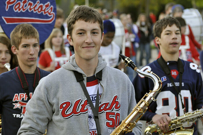Mark performing in the triumphant marching band of Appleton East High School during their traditional Homecoming Parade, 2009.