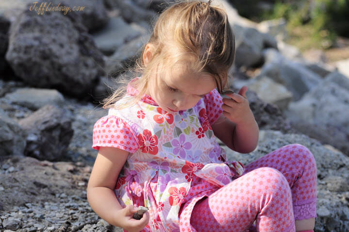 Our granddaughter checking out rocks on the shores of Lake Michigan in Green Bay, Wisconsin.