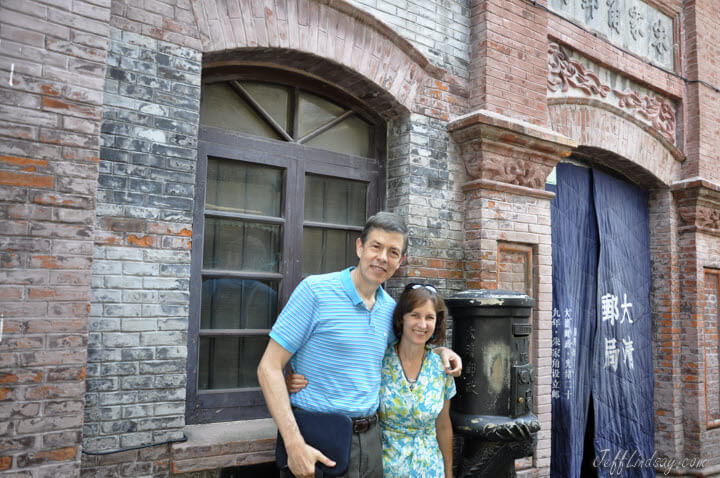 Jeff and Kendra in front of an old mail box in the Chinese village of Zhujiajiao near Shanghai, 2011.