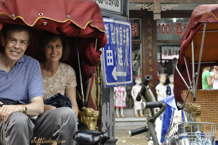 Jeff and Kendra about to embark on a ride of adventure and danger in a rickshaw in Suzhou. We survived!