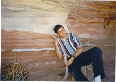 Dad under a ledge, napping?