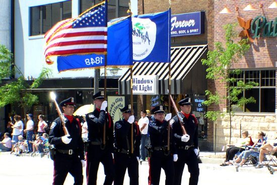 Some of Appeton's finest carry the American flag.