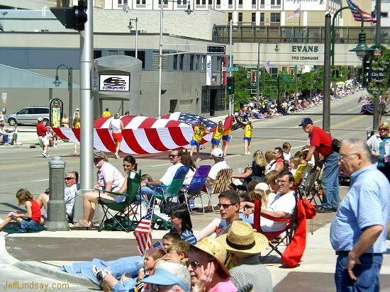 Appleton residents wathcing the Flag Day parade.