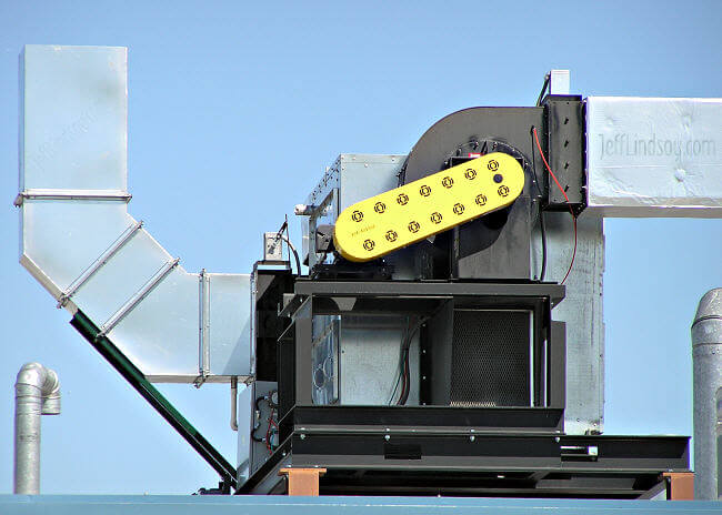 Equipment on top of a building in the southern industrial area of Neenah, Wisconsin (Metso, I believe, near Breezewood/Bell Street). Aug. 2006.