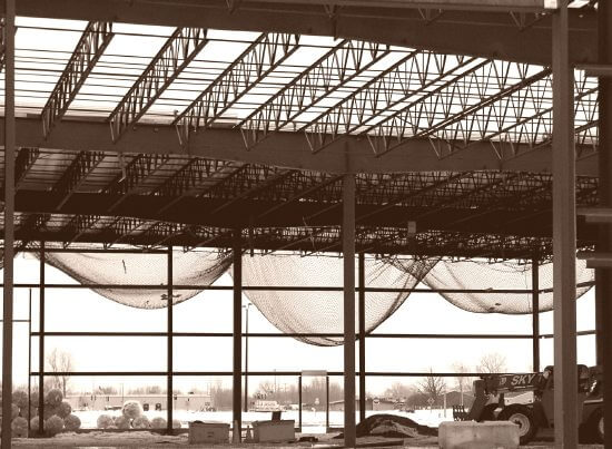 >Safety netting on a new building under construction in the Town of Menasha, March 2003.