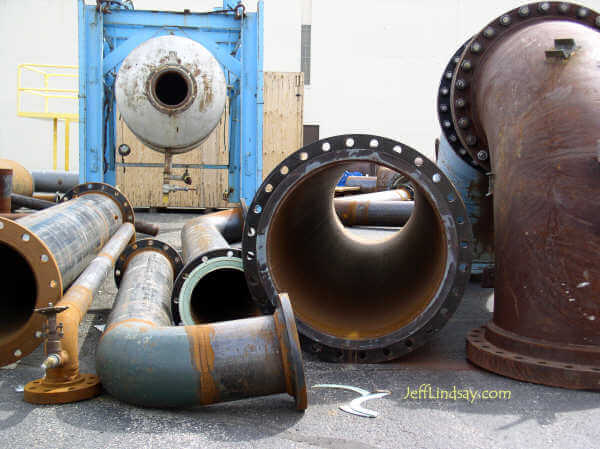 Old pipes and tanks by a factory in Appleton, Wisconsin, summer 2004.