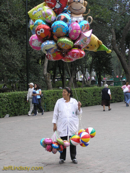 Woman in Mexico City selling balloons, March 2007.