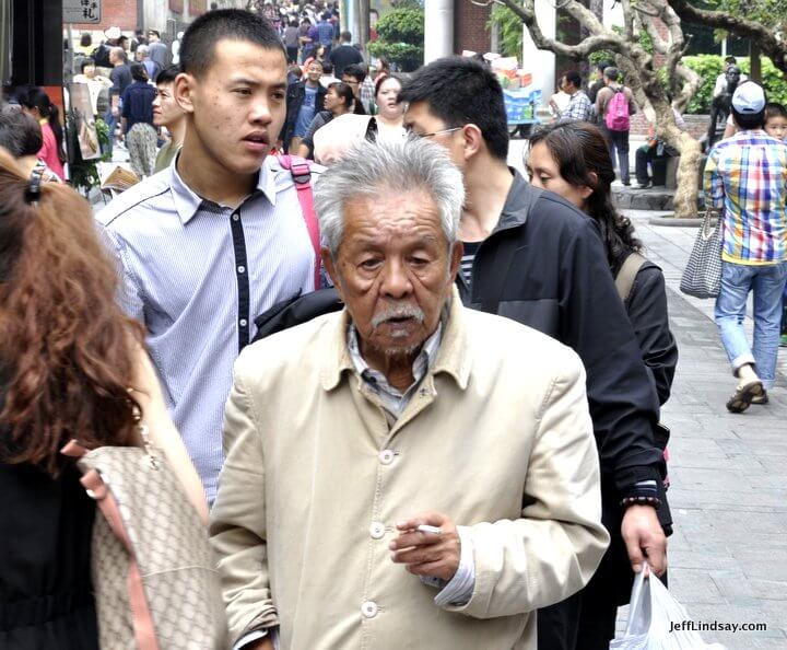                                     Gulangyu, Xiamen, China - street scene with an elderly man