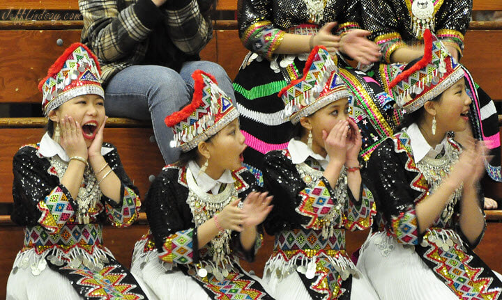 Hmong girls cheering for some dancers at the Hmong New Years celebration at Appleton East High School, Dec. 18, 2010.