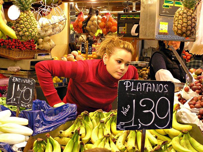Woman selling fruit at the famous downtown market, the Mercat de la Boqueria on the Ramblas in downtown Barcelona, March 2008.
