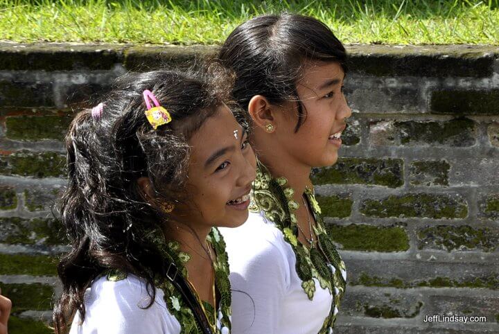 Two girls at Bali's Besakih Temple complex on a religious holiday.