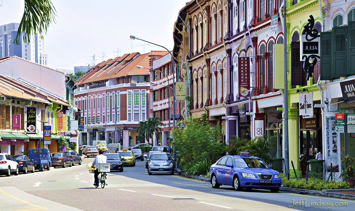 Colorful buildings line the street in this high-end shopping district.