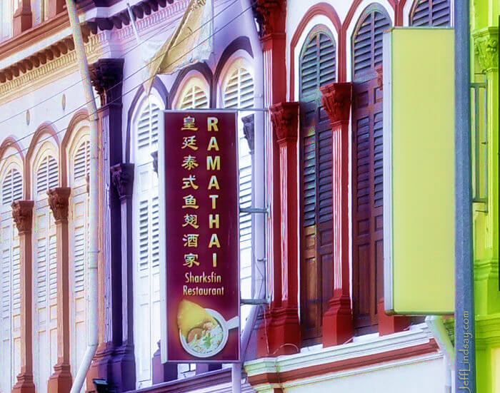 Close-up of a section of buildings featuring a controversial restaurant focused on shark fins.