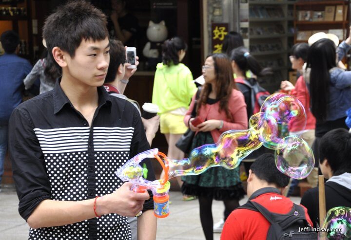 Xiamen, Fujian China, April 2013: make bubbles for pay